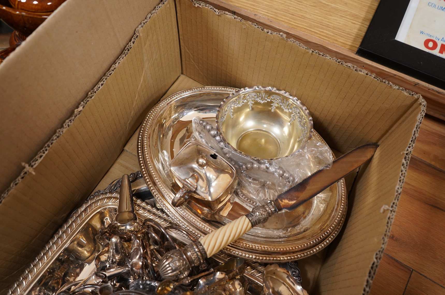 Assorted plated wares including pair of dwarf candlesticks, two pairs of entrée dishes, cased horn handled servers, set of flower holders, bread knife, mustard pot, salver, silver coins, two ceramic toby jugs, four pewte